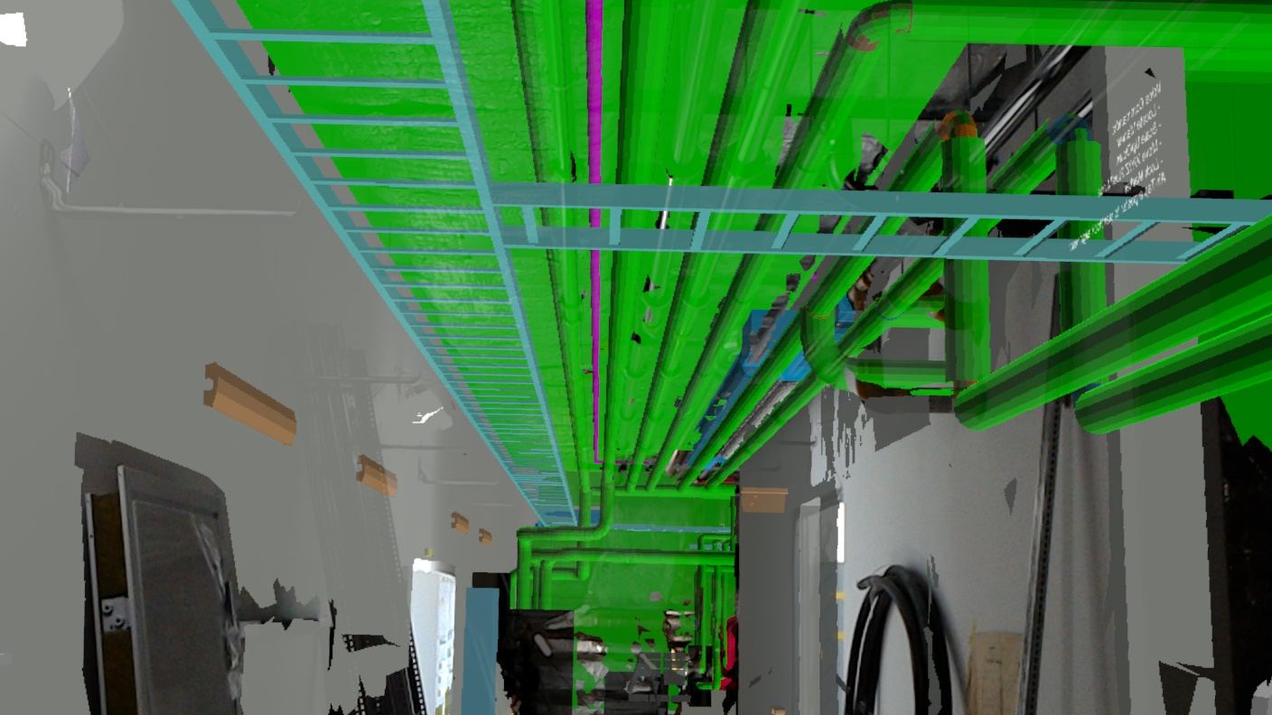 En korridor under byggnation där ventilationstrummor och rör ligger som gröna och cyanfärgade hologram under taket.